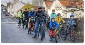 image of villagers on bikes