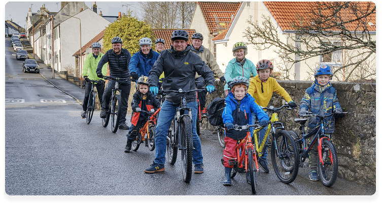 image of villagers on bikes